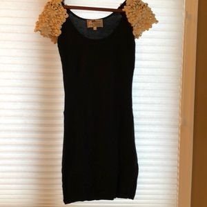 Black knit mini with crochet sleeves